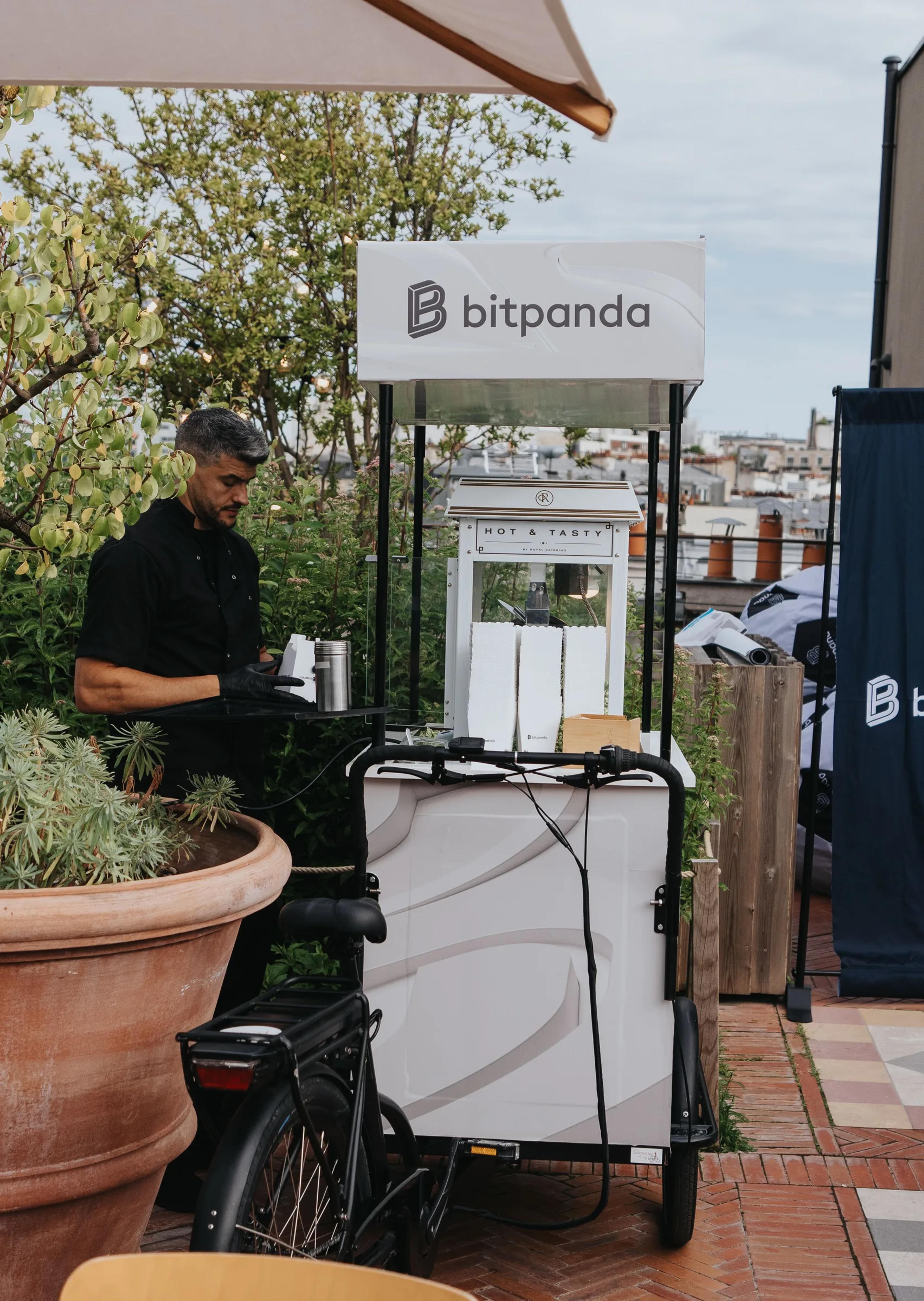 A DJ playing at the Bitpanda-branded booth
