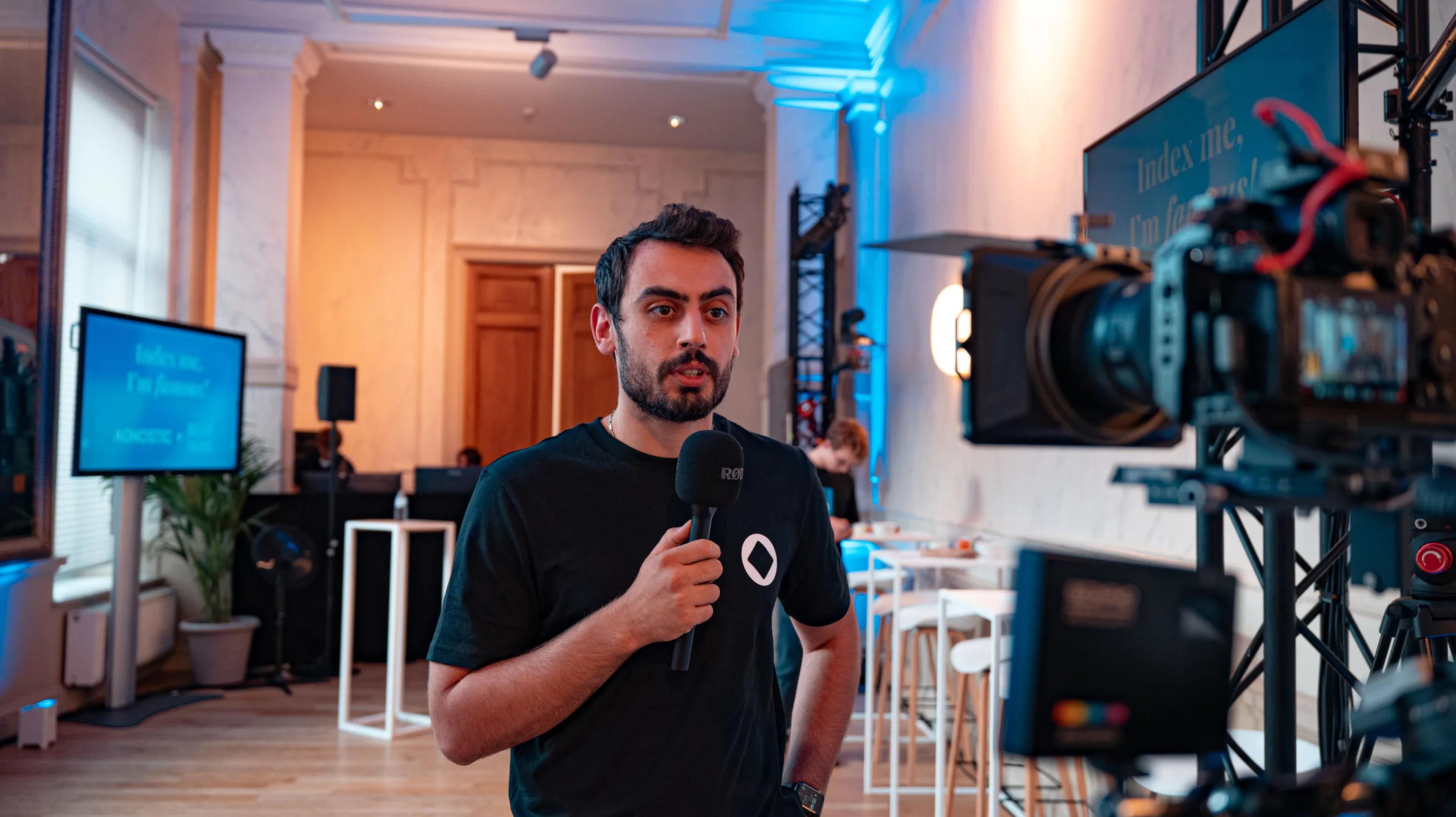 A speaker being filmed for an interview at the Agnostic event