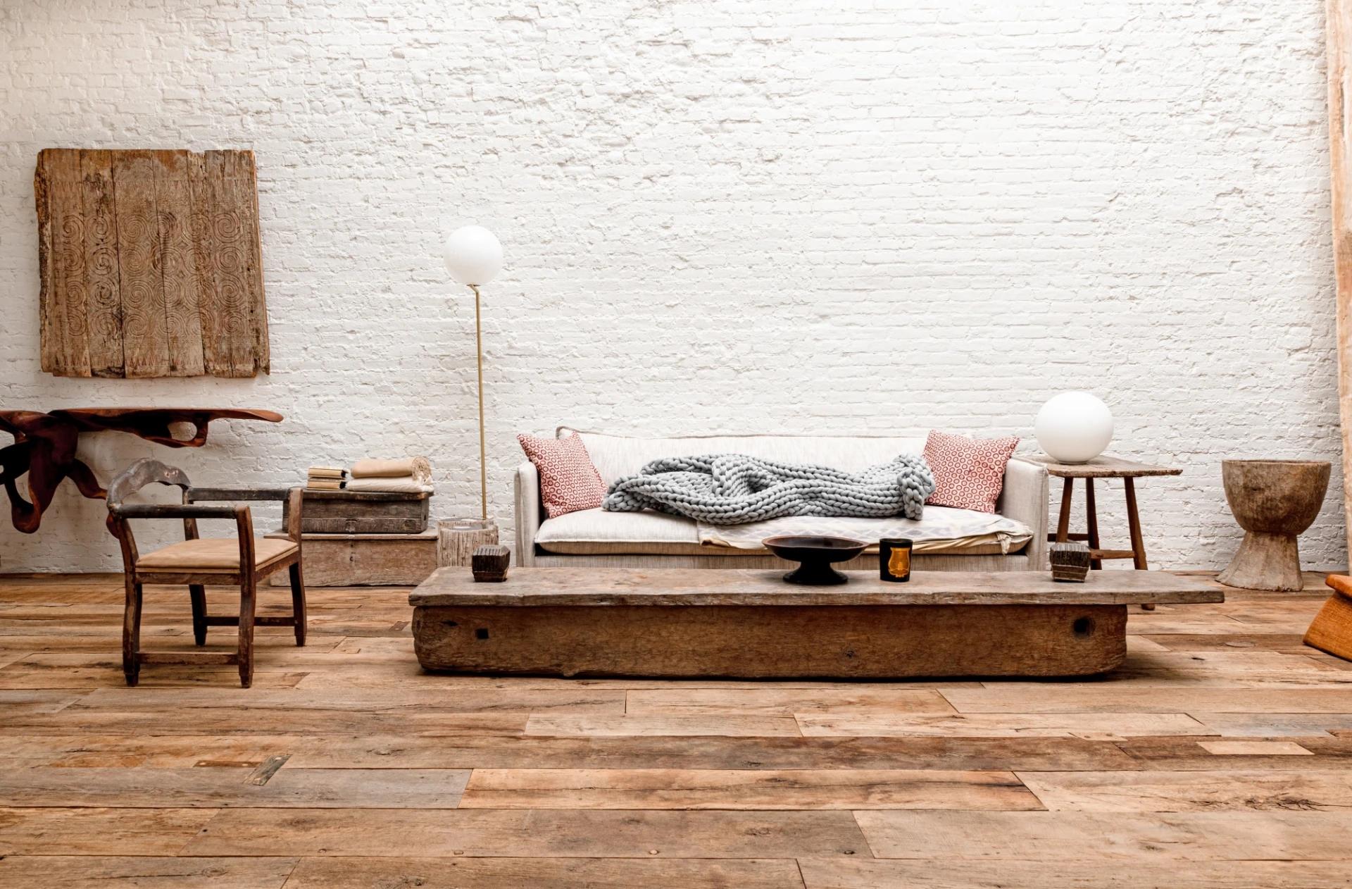 High above the streets of Manhattan, at the summit of a 125-year-old building in Soho, a penthouse merges old-world materiality with uncompromising modern vision. Designed by  Andrianna Shamaris  in collaboration with architect Thomas Leeser, this is a space where every surface has been curated, every detail purpose-chosen.

Shamaris is at the very forefront of modern organic furniture, serving leading architects, designers, stylists, and influential figures worldwide. Her pieces are available on her website and through  1stdibs . Speaking with 1stdibs, Shamaris describes the project, situated in her own penthouse apartment and her most personal to date, as “about imperfection.” Her vision called for texture over color, and form over ornament.

This ethos is felt most powerfully underfoot. The floors - wide 17th-century French oak boards - were carefully reclaimed, restored, and finished by our artisans. Each board was selected to retain its raw character: weathered grain, natural variation, the visible imprint of centuries past.