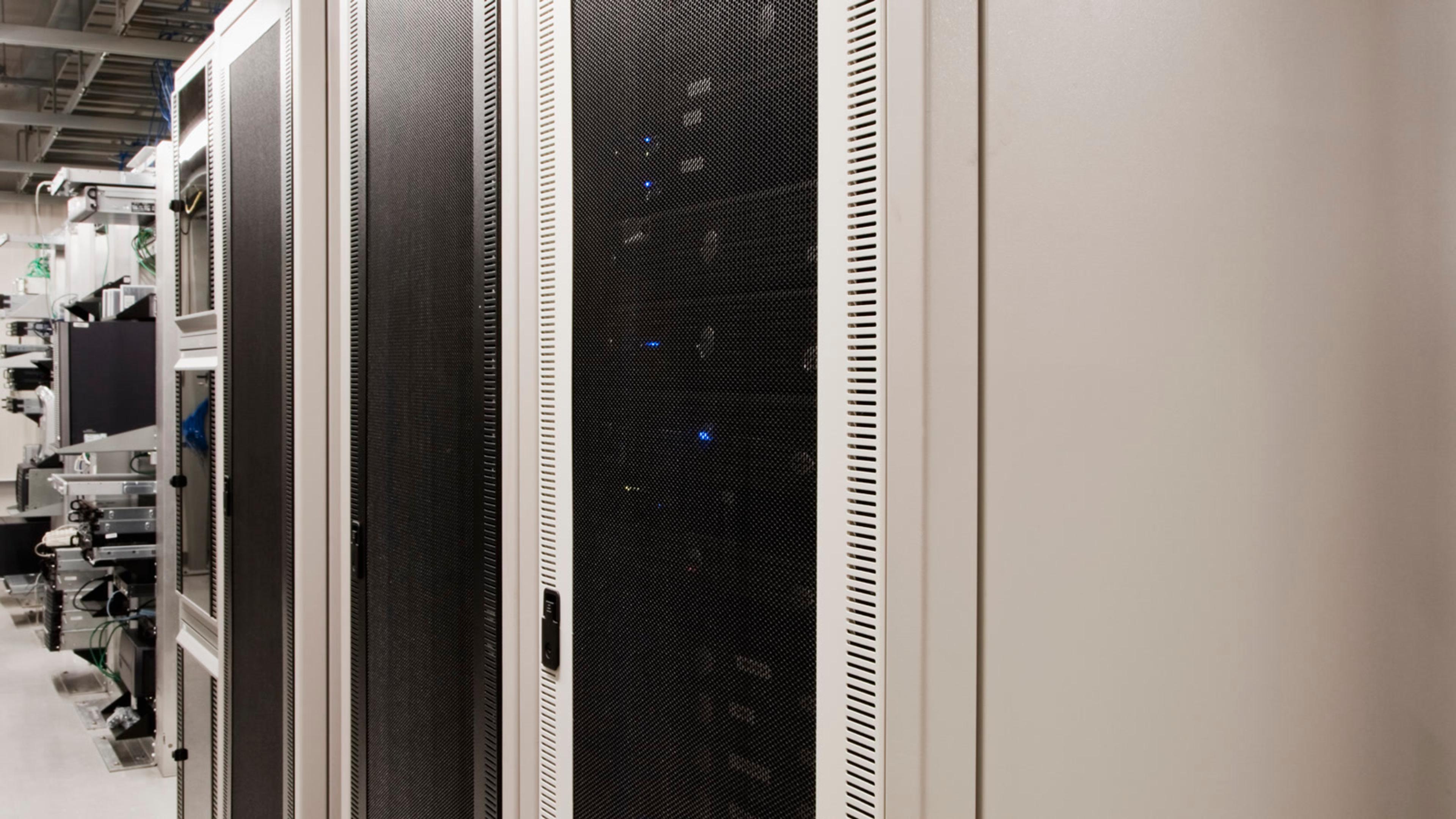 Server room with rows of data storage equipment — Asterisk and FreeSWITCH need SIP push