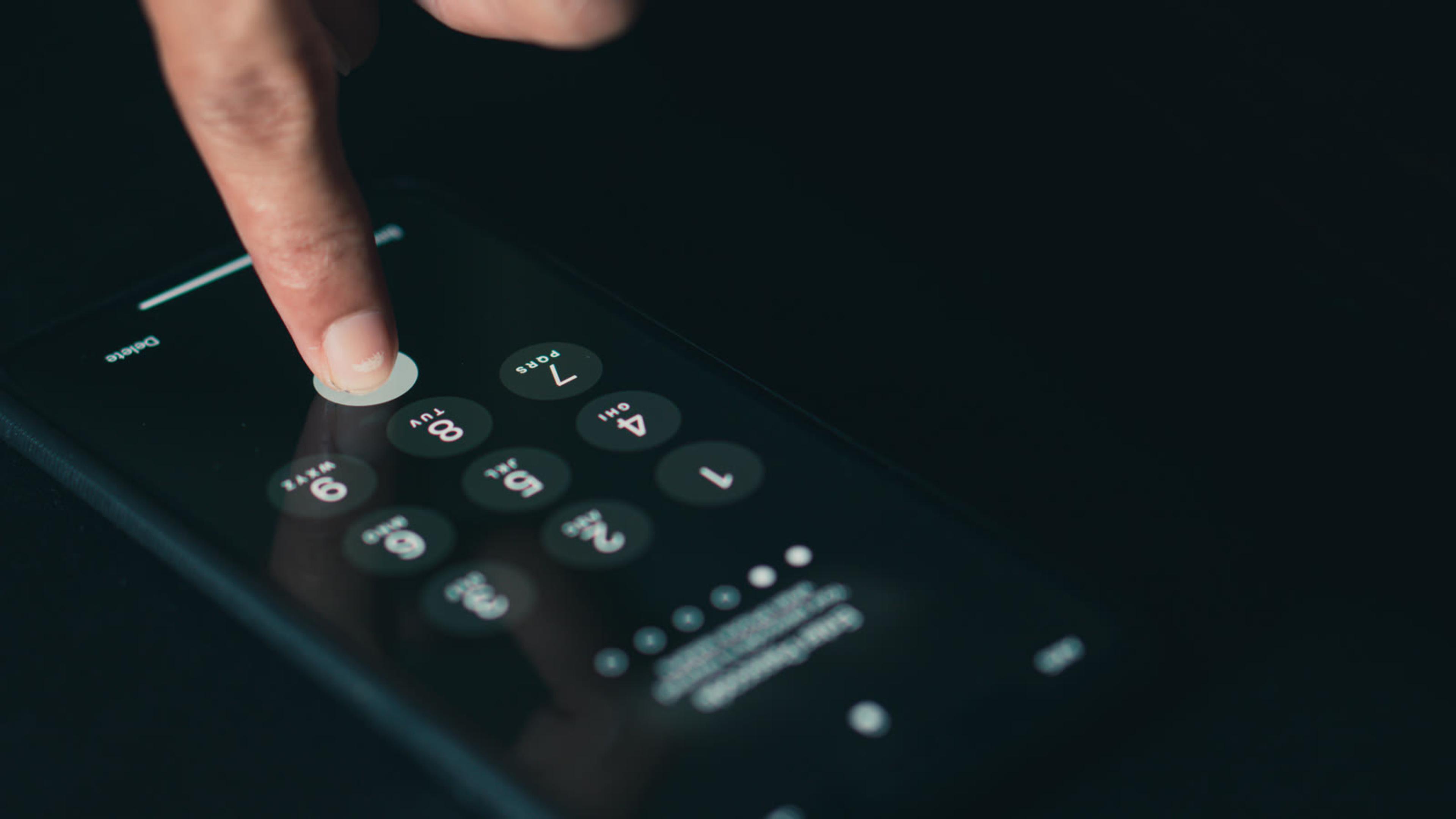 Finger using a smartphone keypad to send DTMF dial tones