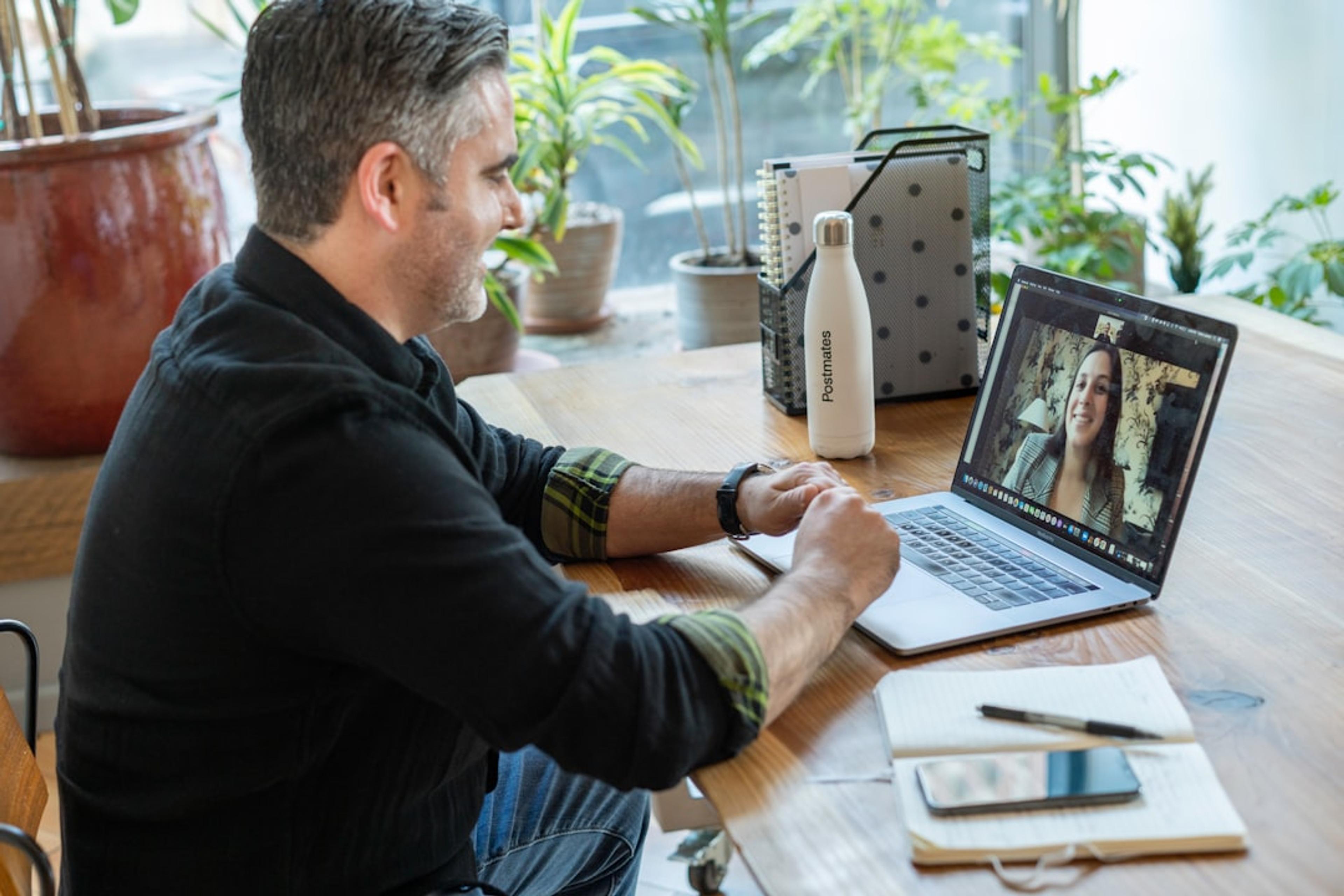 Remote business user on a laptop call for managed VoIP deployment