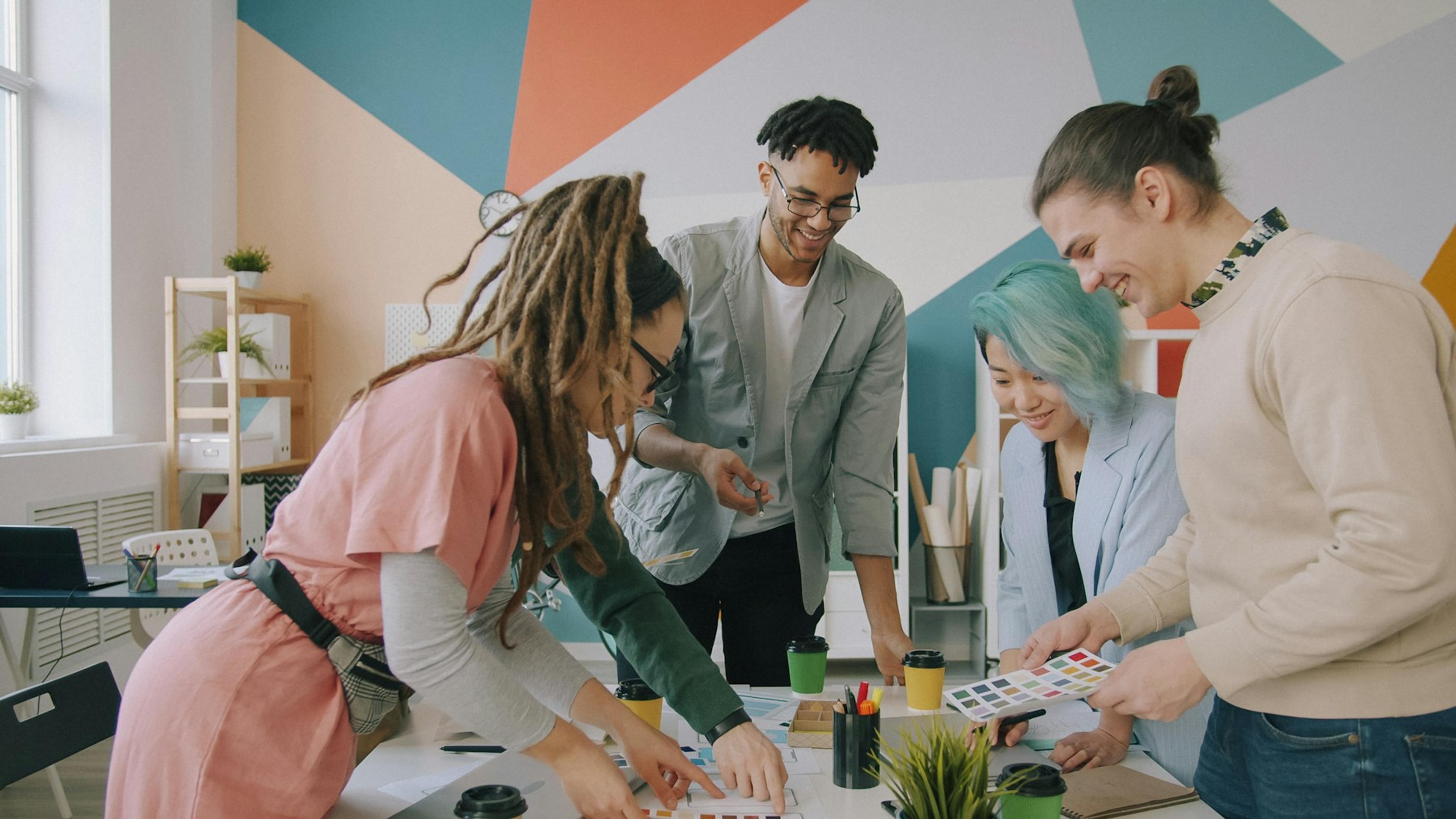 Small business team collaborating on a customer call-routing plan