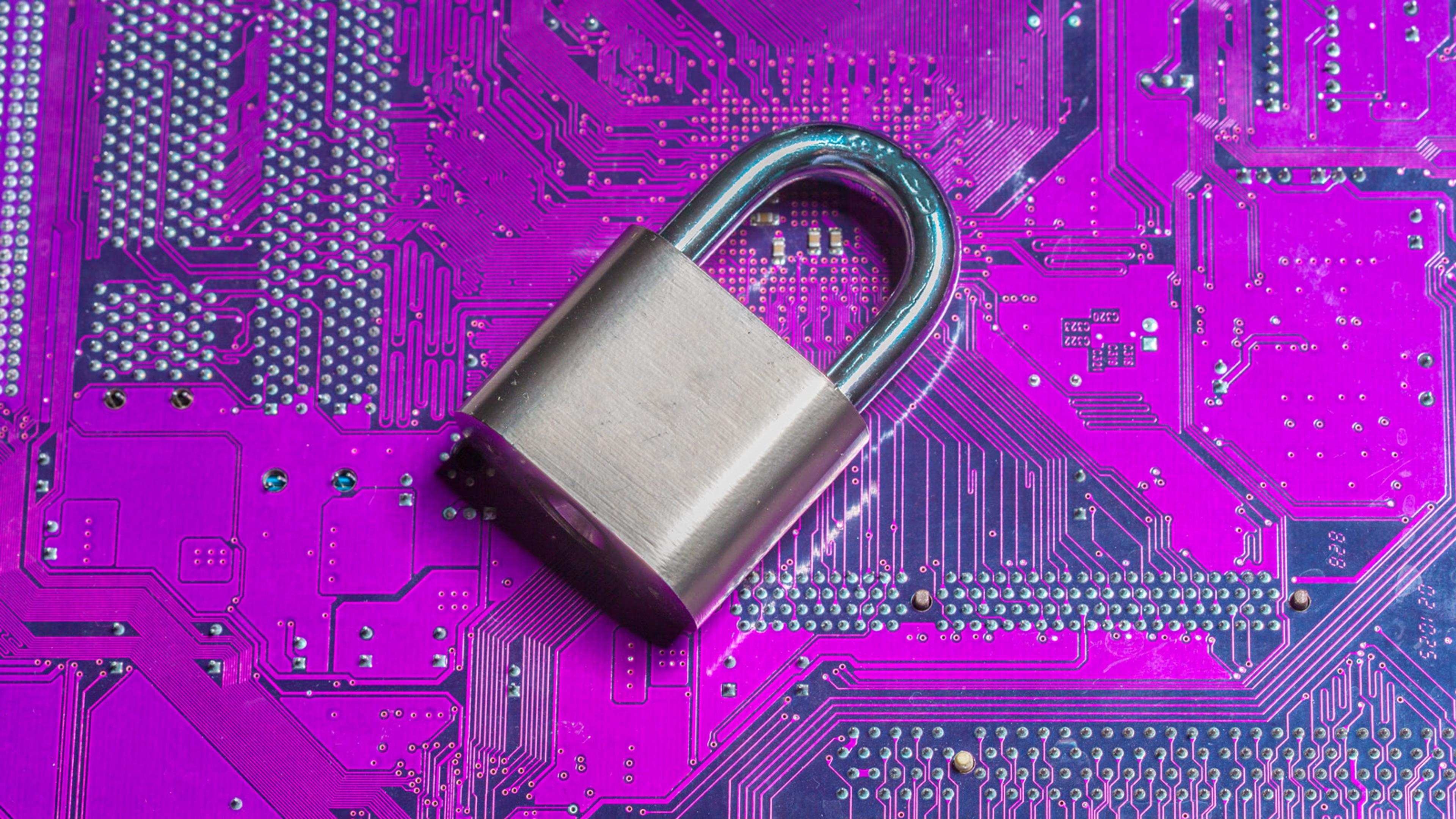 Silver padlock on a purple circuit board — SIP TLS and SRTP encryption