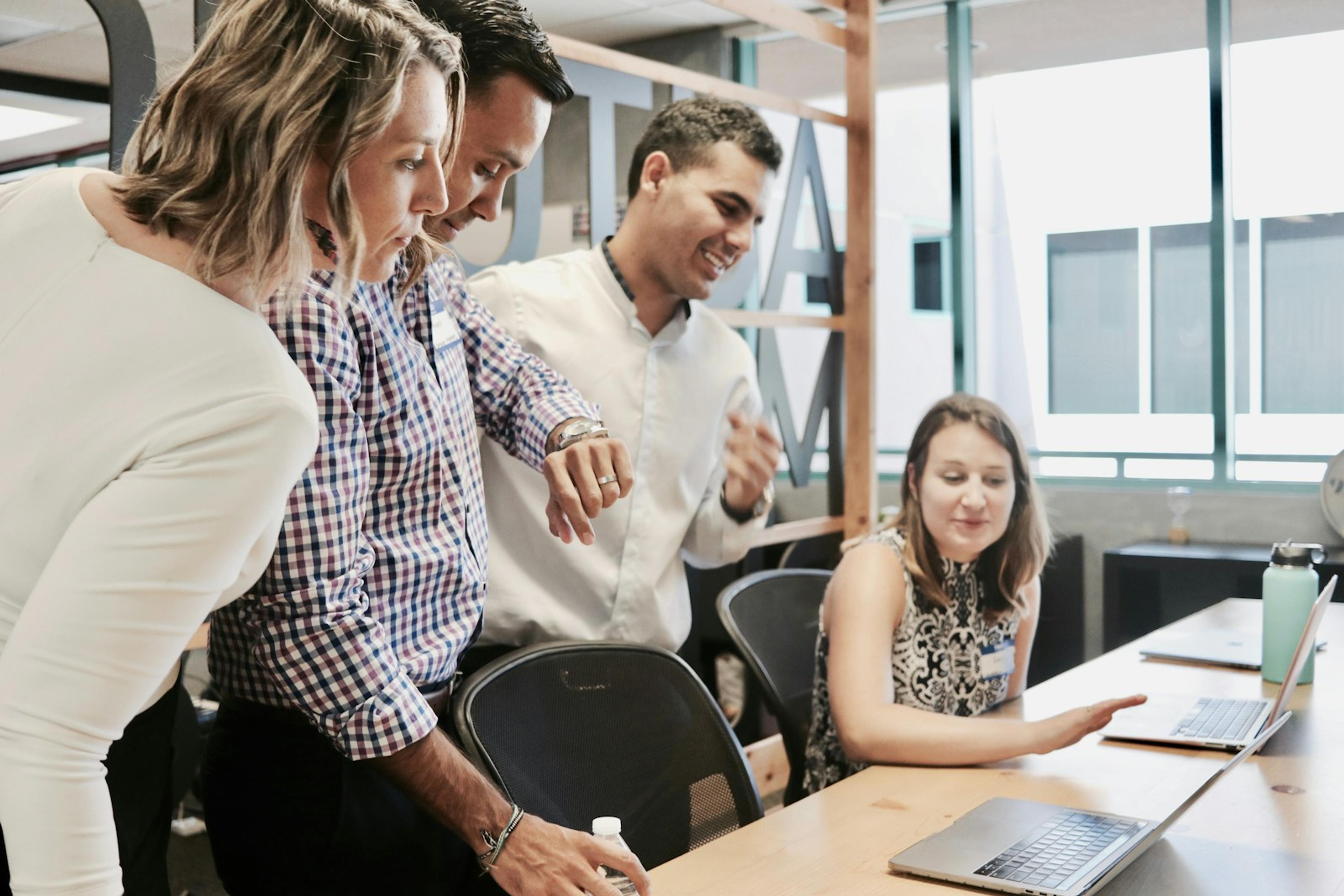 Sales professional reviewing follow-up notes at a desk
