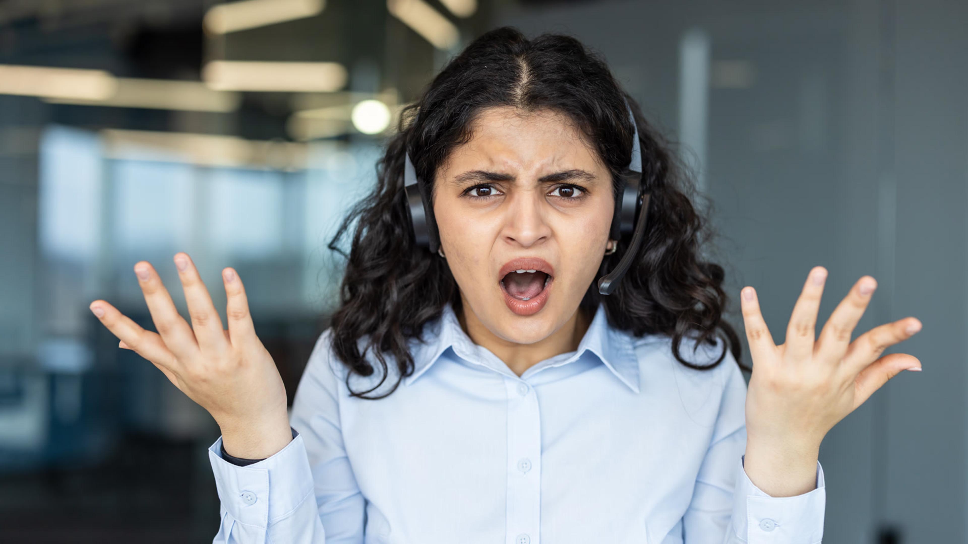Caller frustrated by one-way audio on a headset call