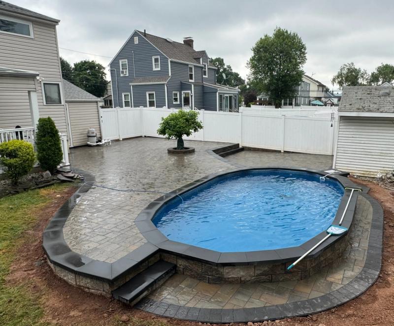 Oval semi-inground with raised deck, Linden NJ