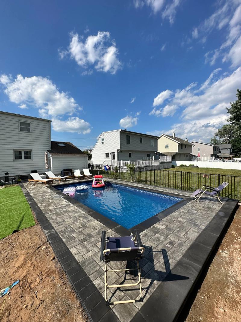 Charcoal coping and modern deck