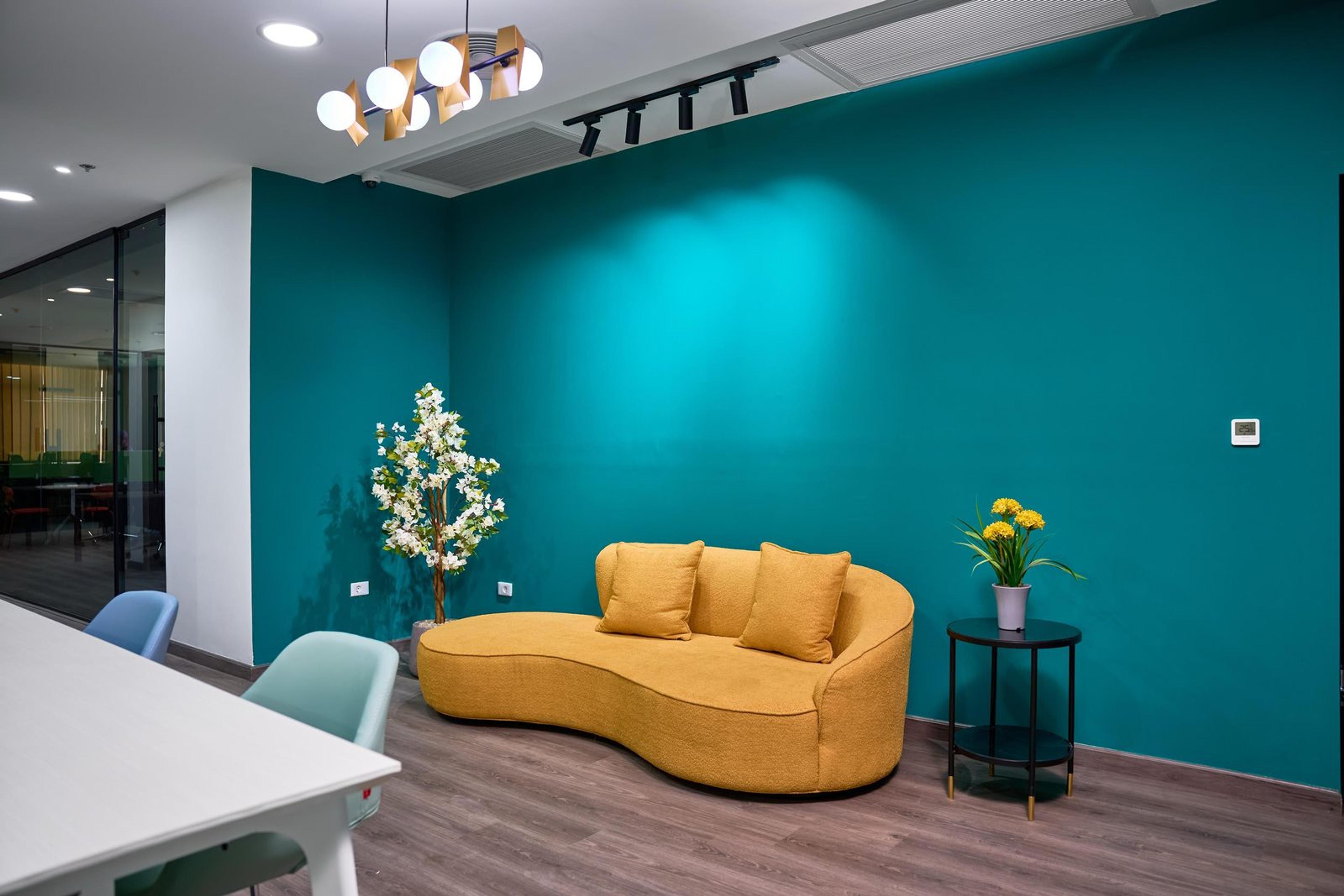 Lounge area at KEHEILAN Central Hub with a ceiling camera