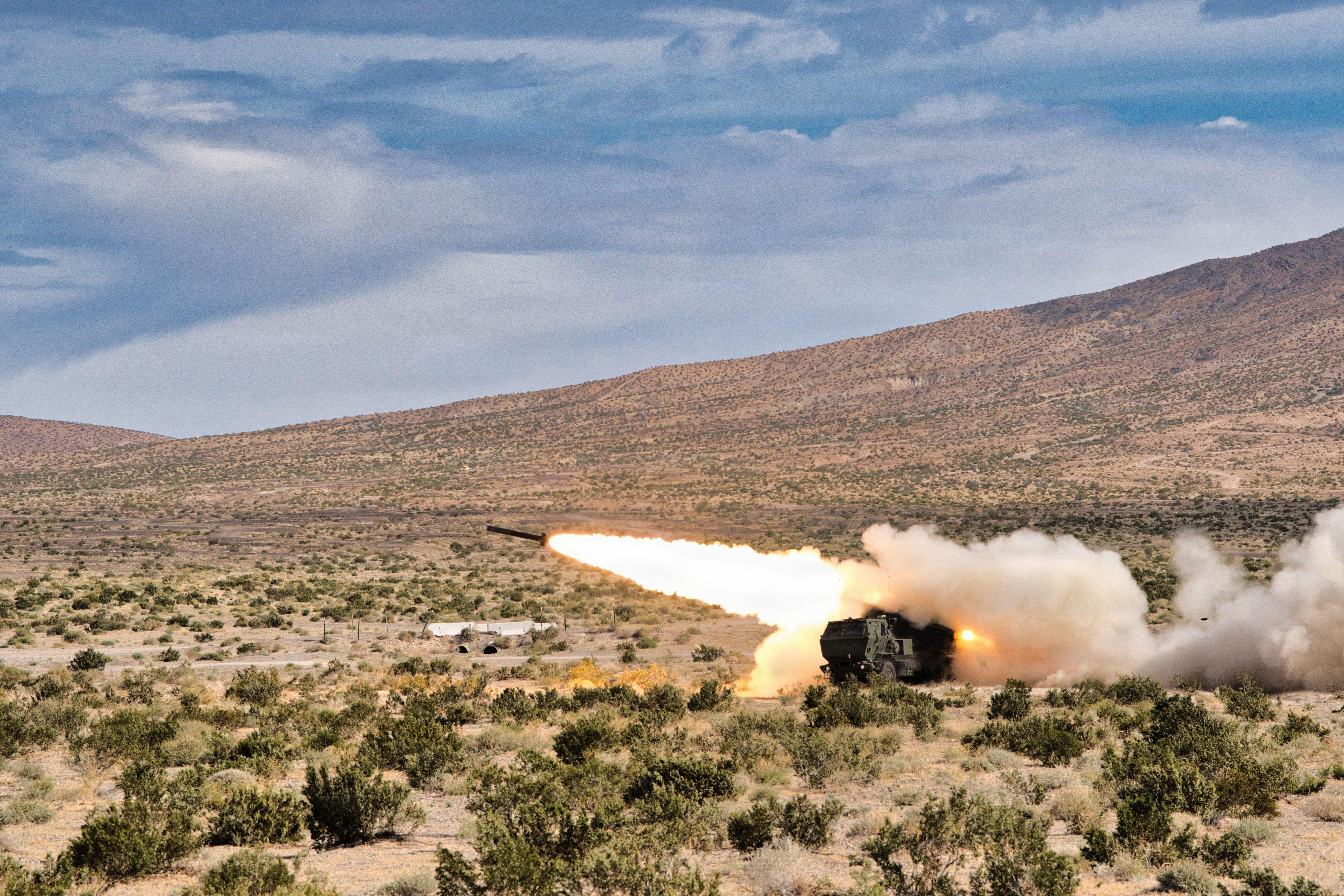 HIMARS weapon system firing a missile.