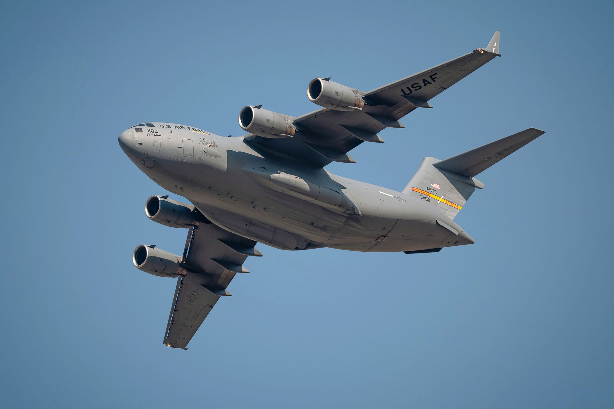 Military transport aircraft on a desert runway