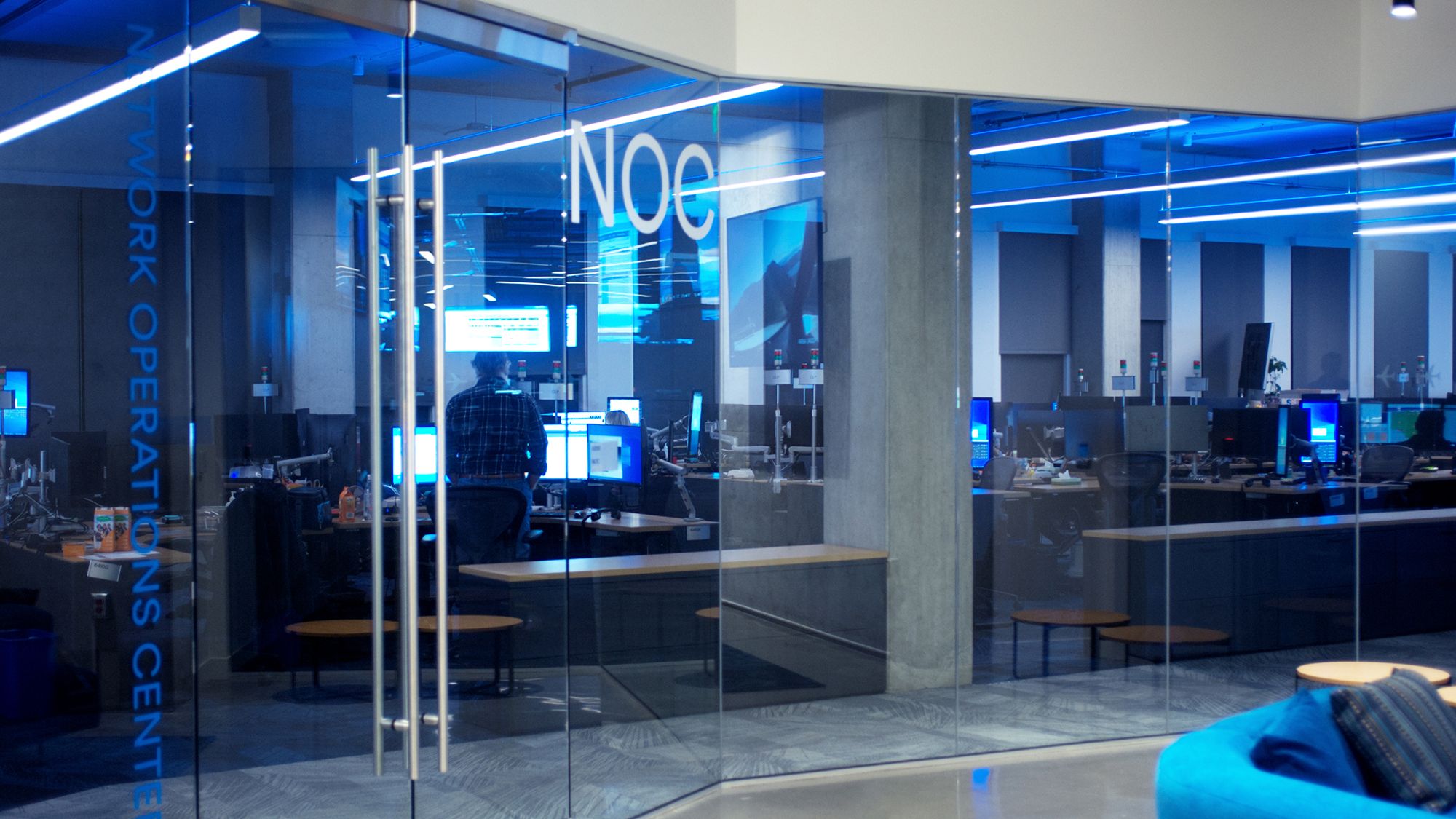 Network operations centre behind glass
