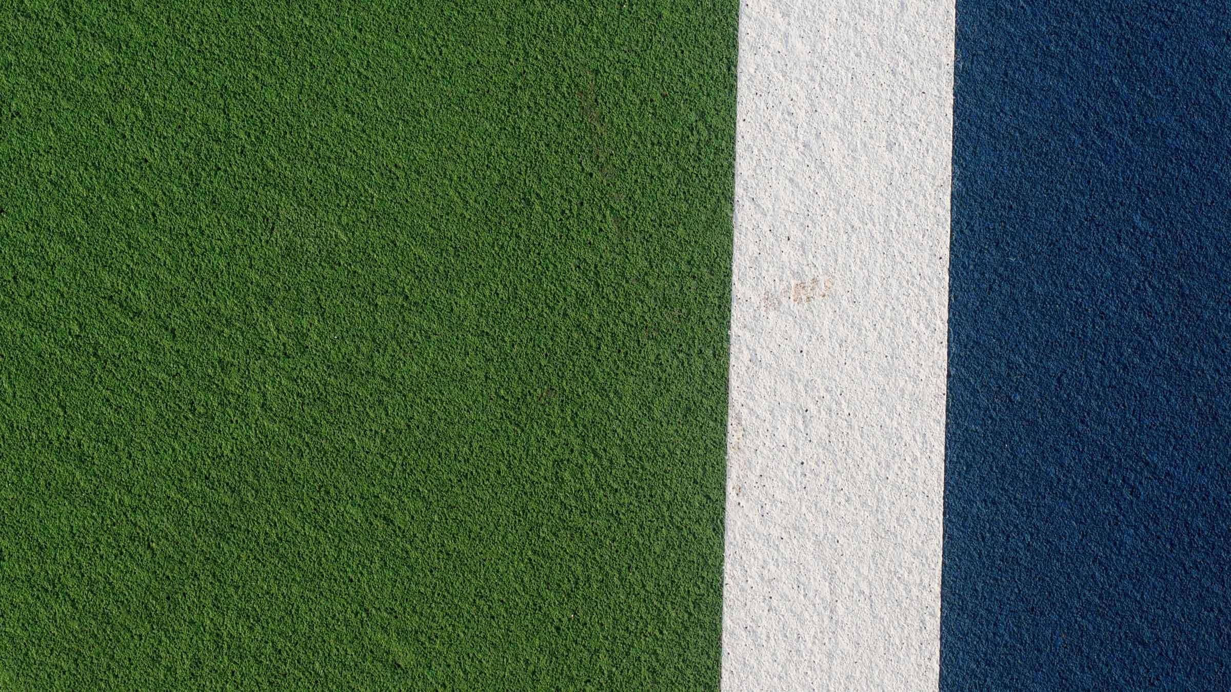 An empty tennis court, seen from above