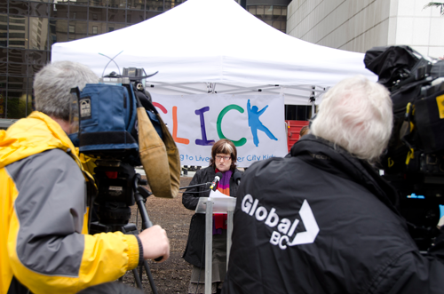 A Global BC camera operator films a speaker at the CLICK tent