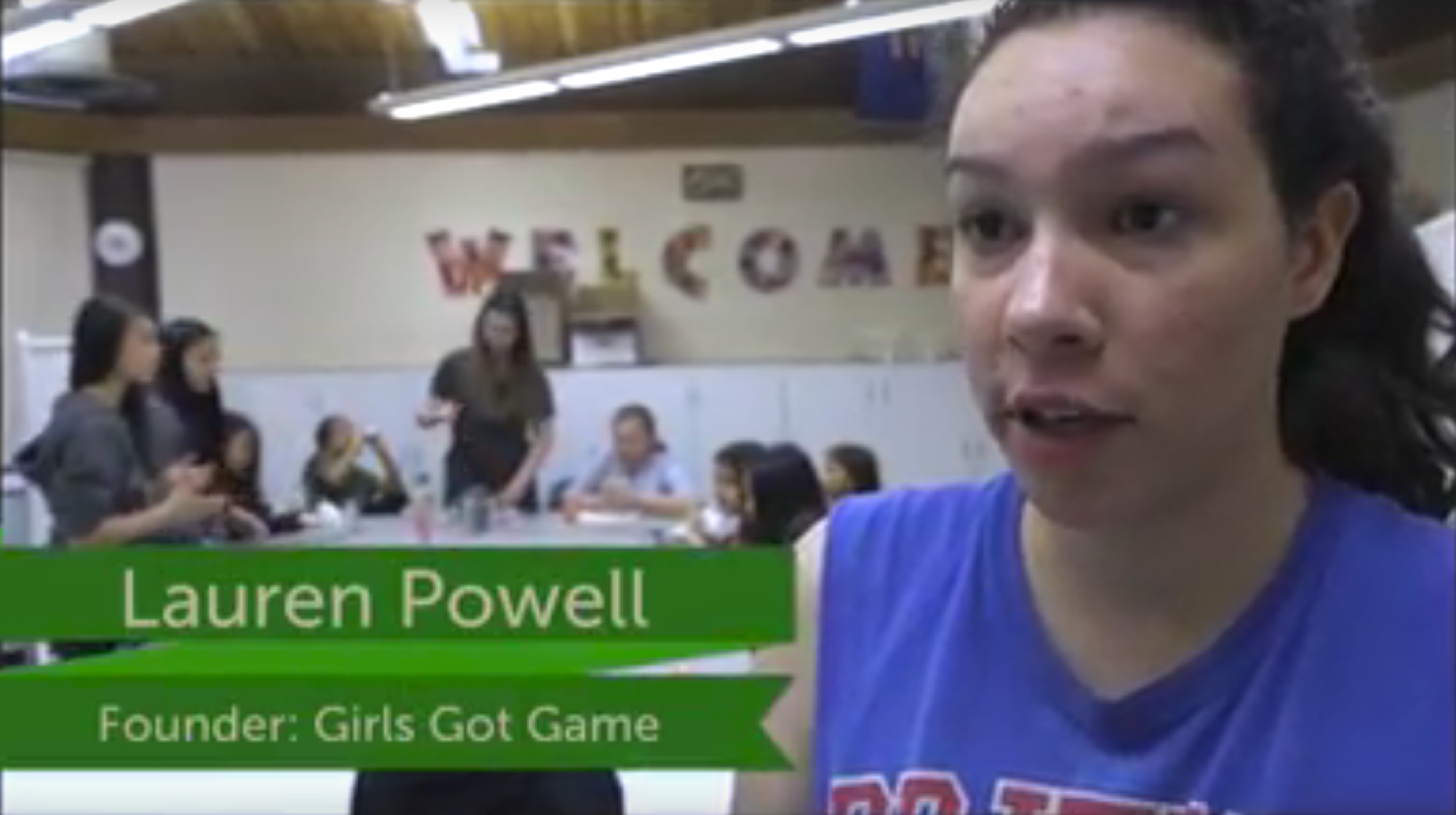 Lauren Powell, founder of Girls Got Game, speaking to camera in a community centre