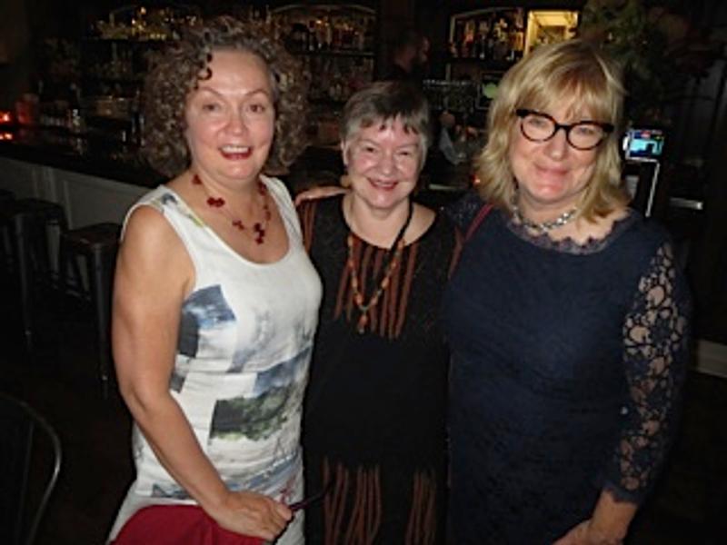Guests standing together at the end of the evening