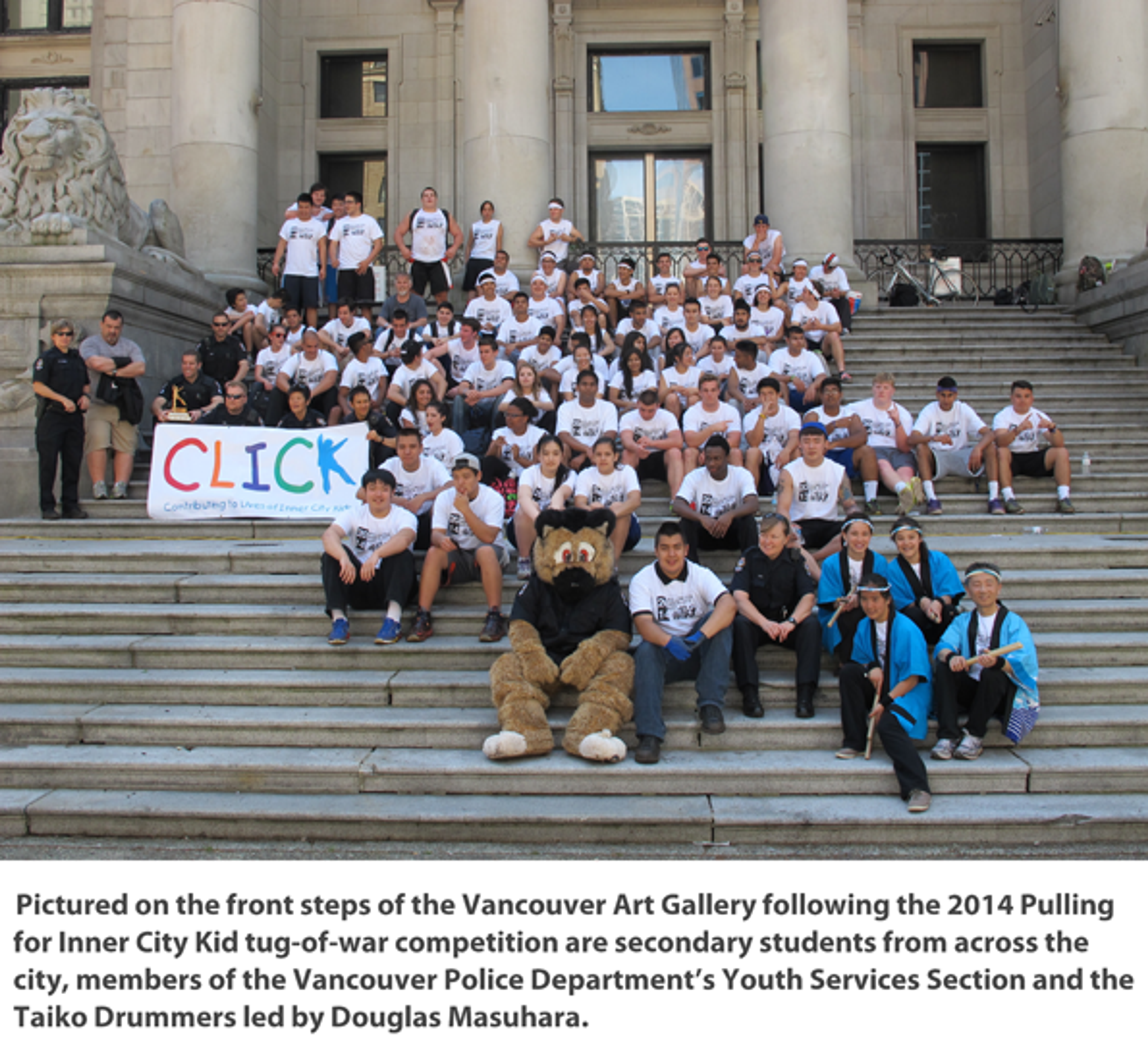 Secondary students from across Vancouver, members of the VPD's Youth Services Section and the Taiko Drummers led by Douglas Masuhara, on the Art Gallery steps after the 2014 tug of war