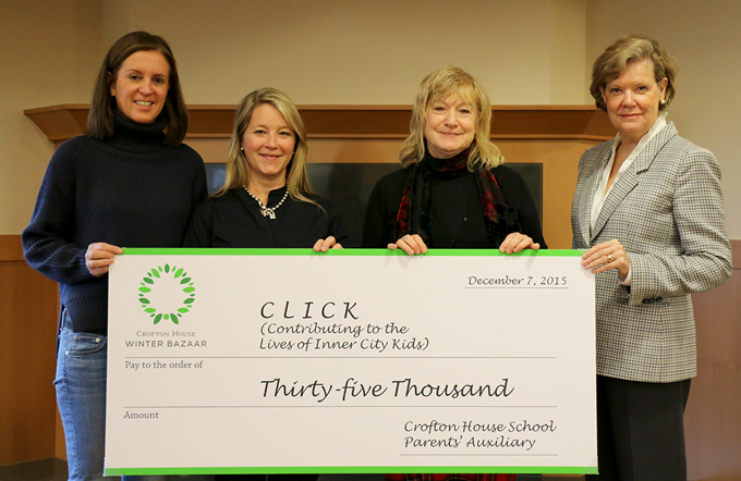 Crofton House School representatives present a $35,000 cheque to CLICK president Catherine Atyeo