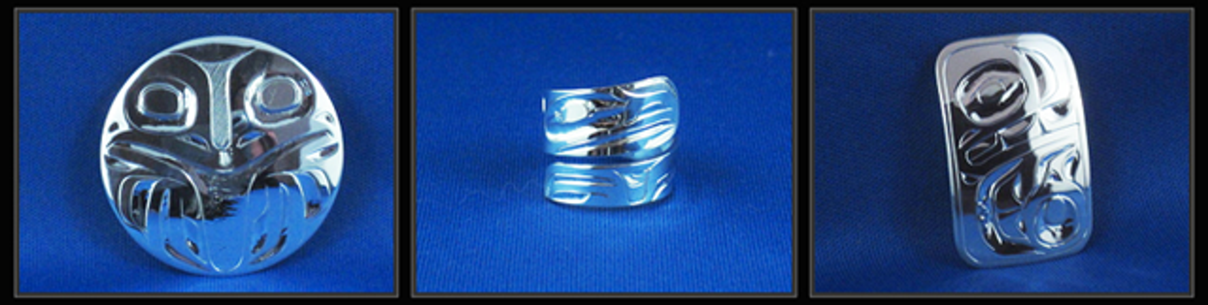 Three of Alvin Adkins's Haida silver pieces — a carved pendant and two bracelets