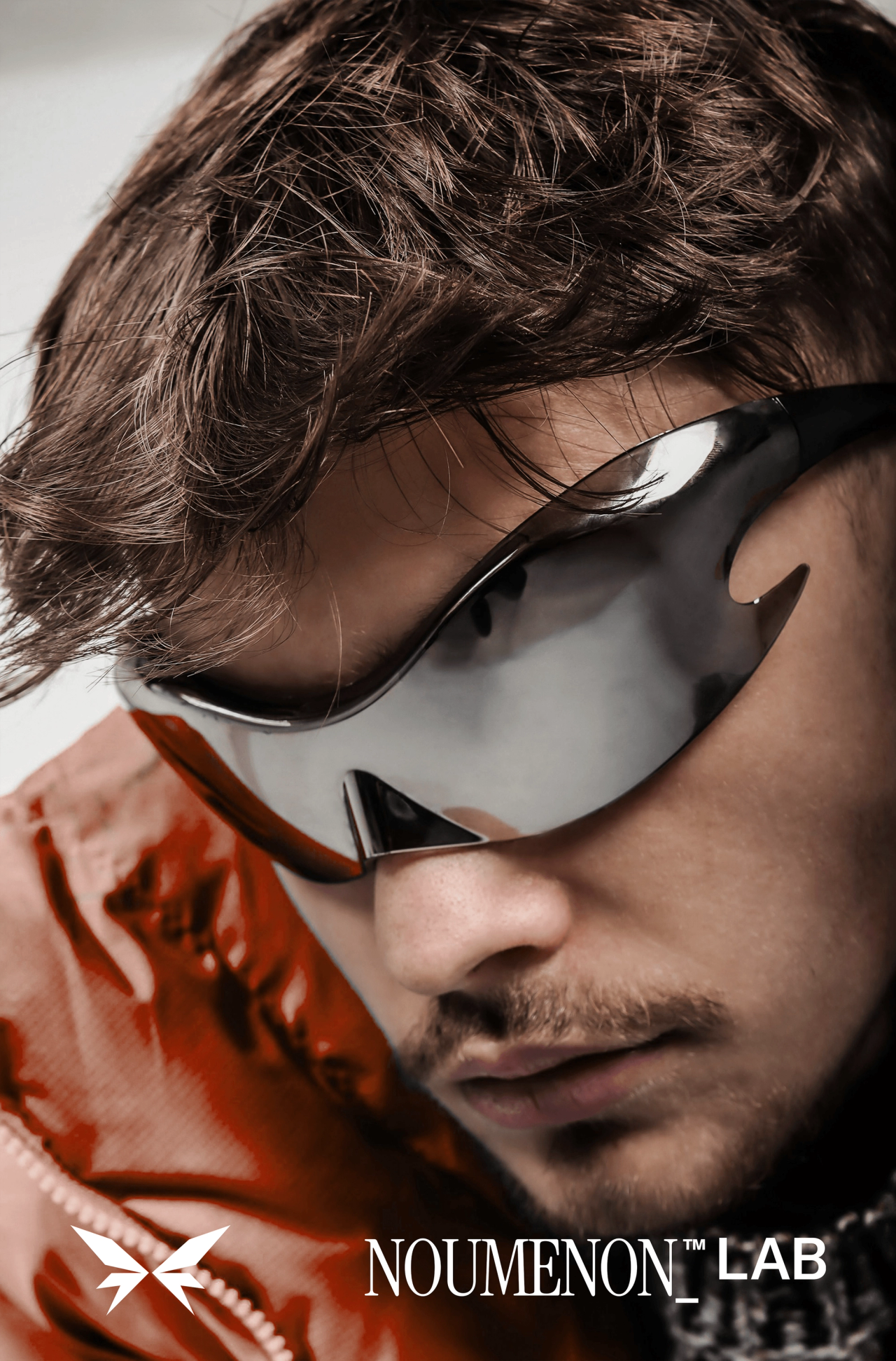 A man in wraparound sunglasses