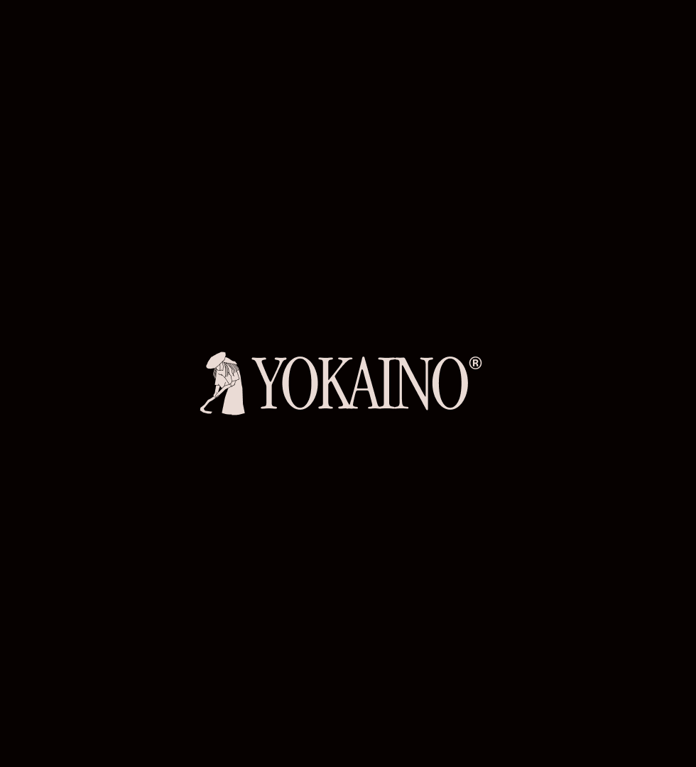 The Yokaino logo, a stooped figure in a hat beside the wordmark, on black
