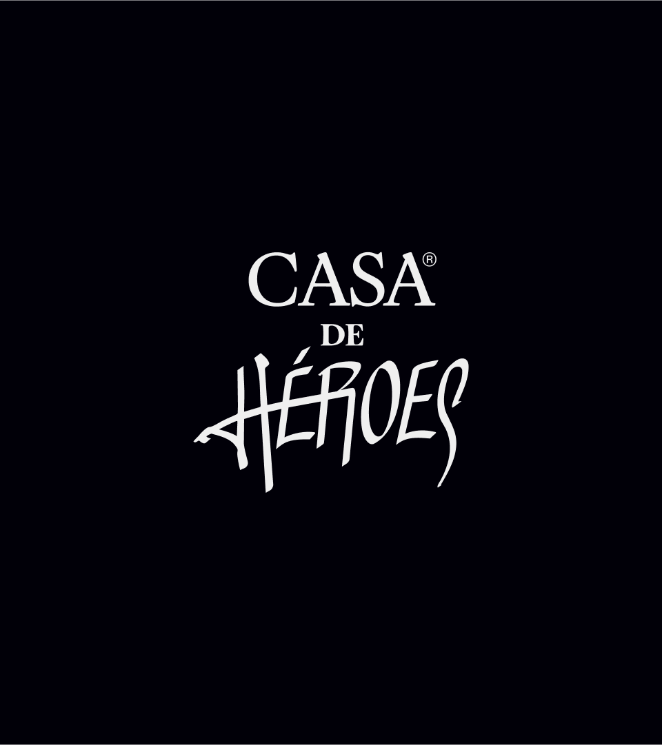Stacked Casa de Héroes wordmark in white with a brush-script Héroes, on black