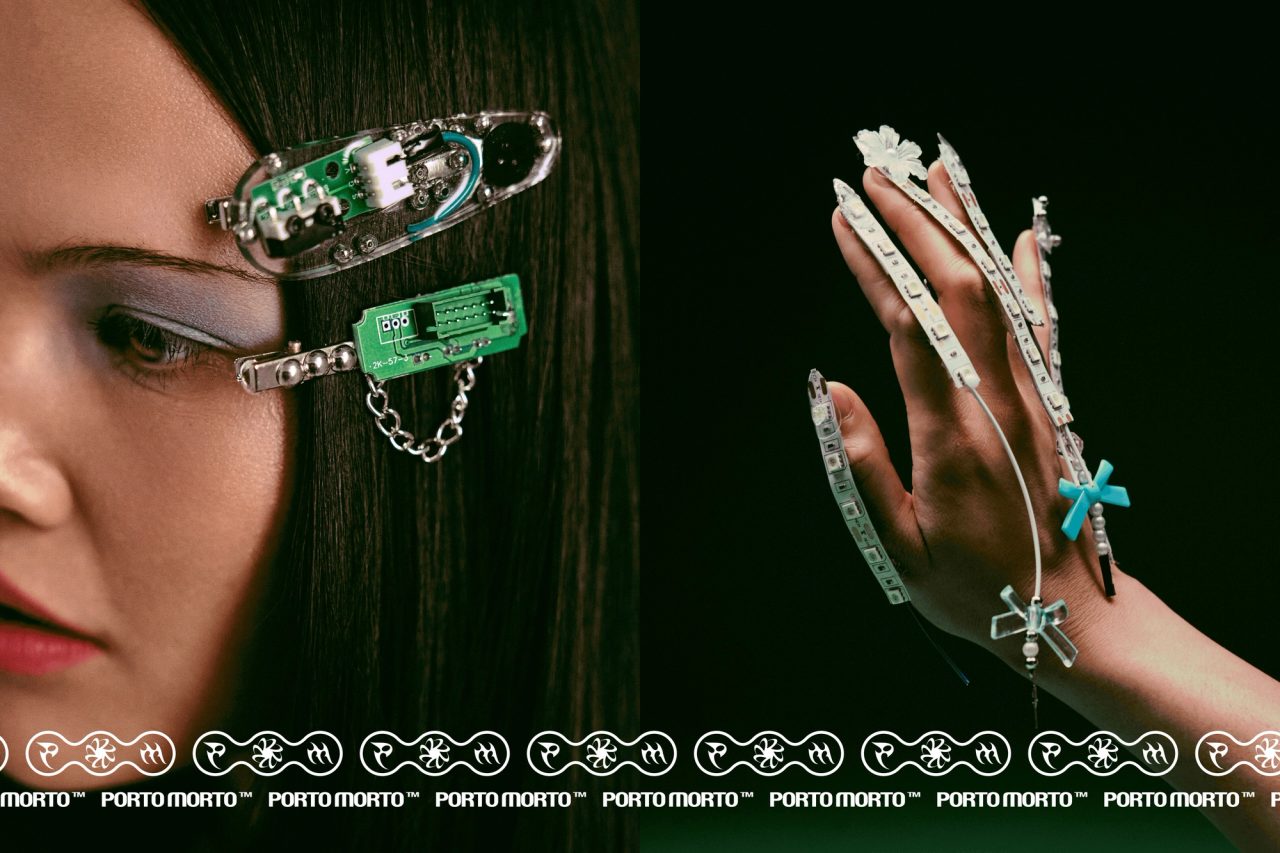 A woman in circuit-board hair clips beside a hand with circuit-strip claws above PORTO MORTO logos
