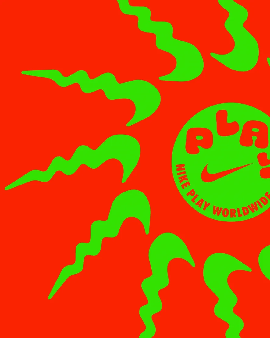 Green wavy swooshes radiating like sun rays on red around a Nike Play Worldwide badge