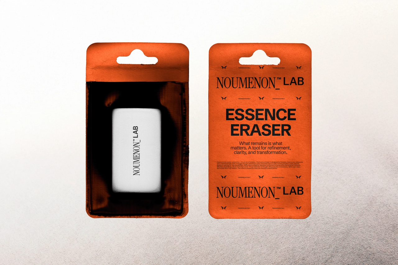 Two orange NOUMENON LAB hang packs, one holding a white eraser, one reading "Essence Eraser"