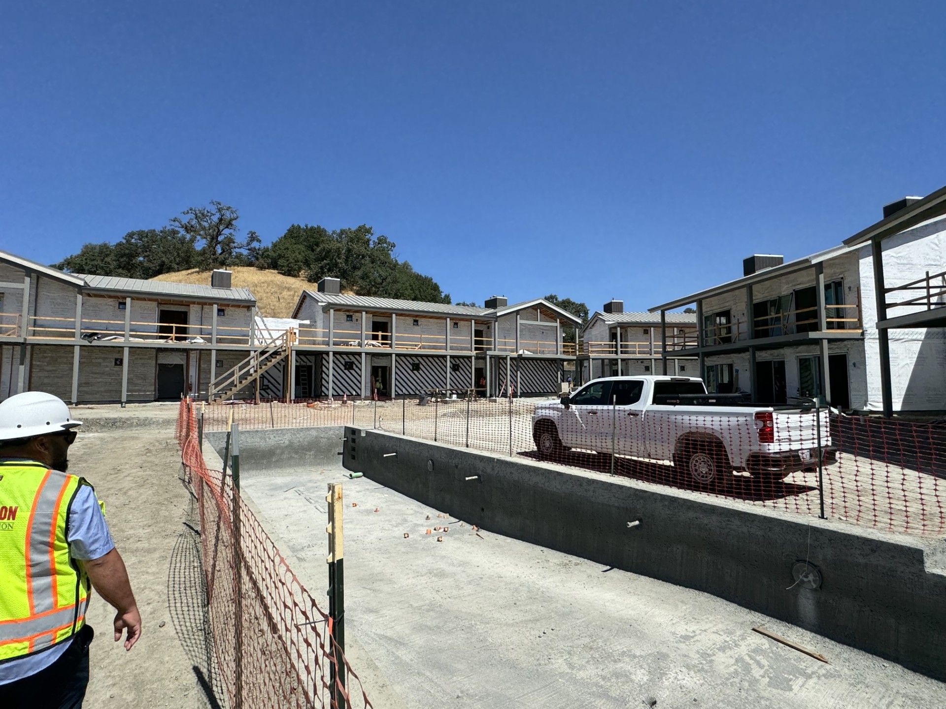 The concrete pour of the pool near the fitness area is complete