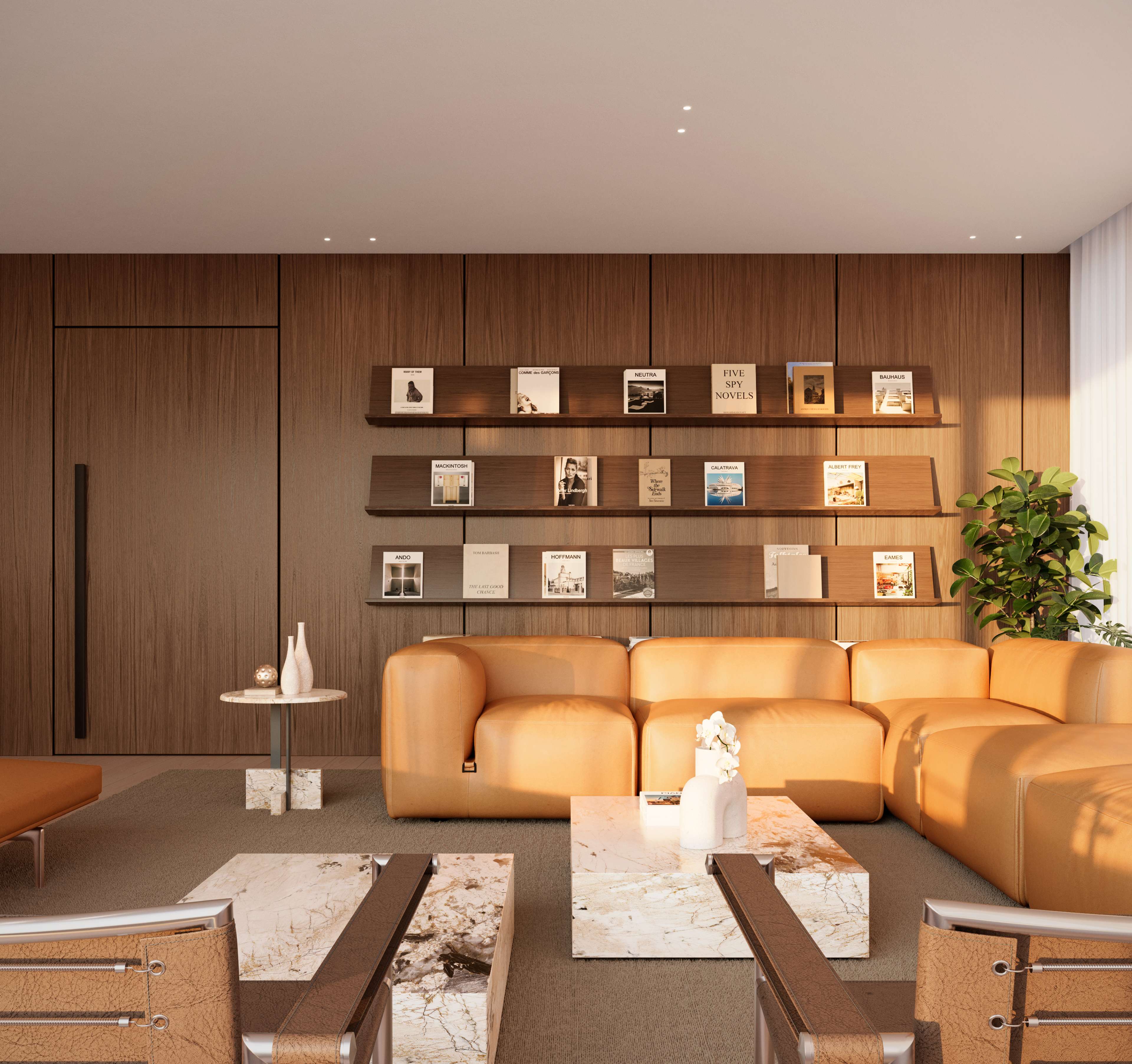 Render de un lounge para residentes con sofás de cuero color camel frente a una estantería iluminada con libros y objetos