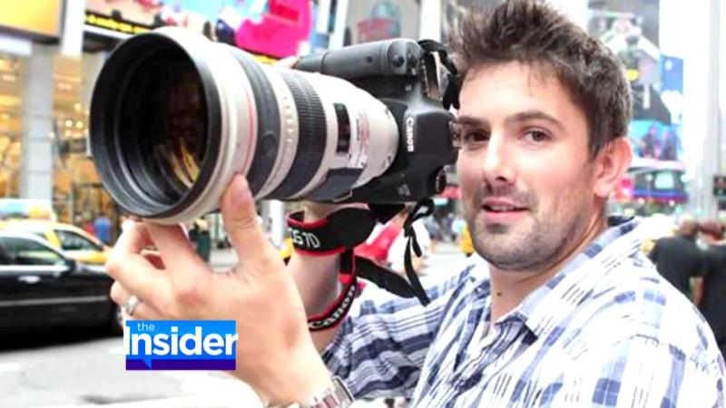 James Ambler, founder of Paparazzi Proposals, with a long lens on the street