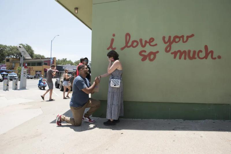Austin Engagement Proposal Photography: Azan and Annabelle – surprise proposal at Jo's Coffee Mural, Austin