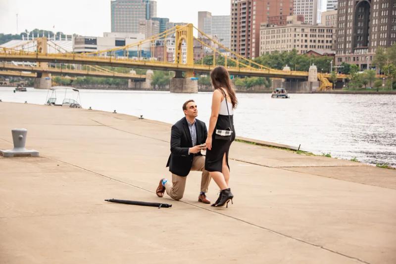 Riverfront Proposal Beneath Pittsburgh's Yellow Bridges – surprise proposal at North Shore Riverwalk, Pittsburgh