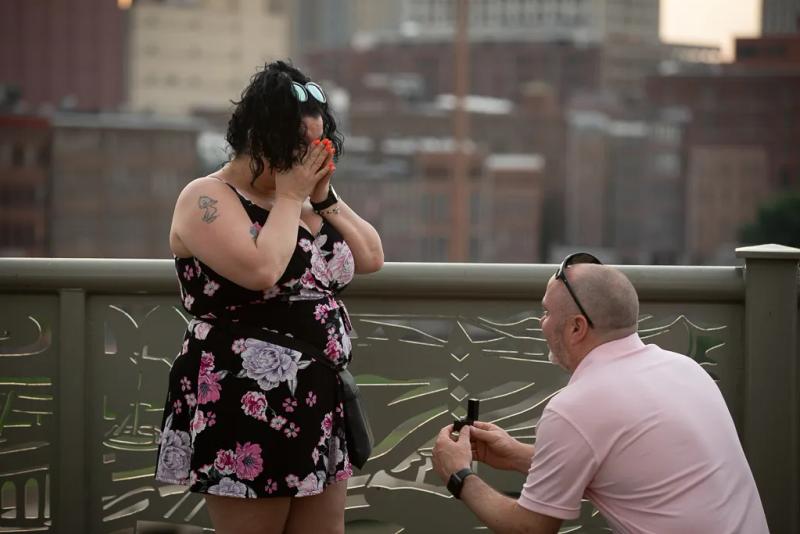 Nashville Proposal Photography: Joshua and Hope – surprise proposal at Seigenthaler Pedestrian Bridge, Nashville