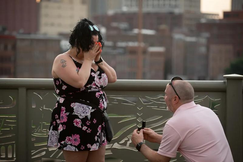 Nashville Proposal Photography: Joshua and Hope – surprise proposal at Seigenthaler Pedestrian Bridge, Nashville
