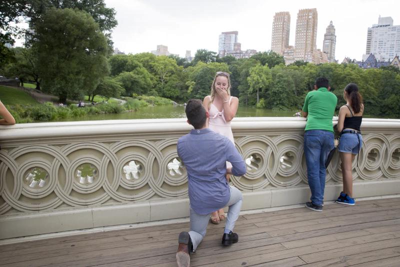 A couple embracing during a proposal