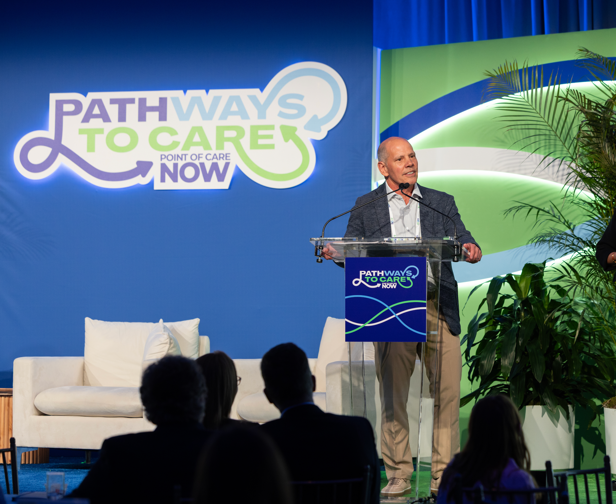 Mike Collette accepts Lifetime Achievement Award at the 2026 POC Now Summit at Pier Sixty in New York City