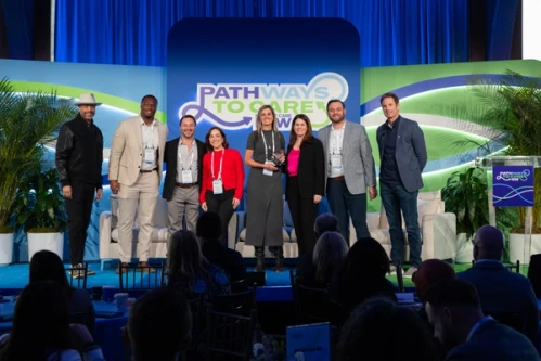 Representatives from Phreesia Network Solutions accept the award for Best Unbranded Campaign at the 2026 POC Now Summit at Pier Sixty in New York City.