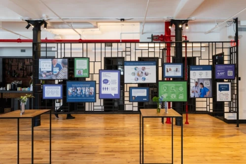 An display wall at POCMA's June 2026 Candid Conversations Event in New York City showcasing the connected Point of Care ecosystem.