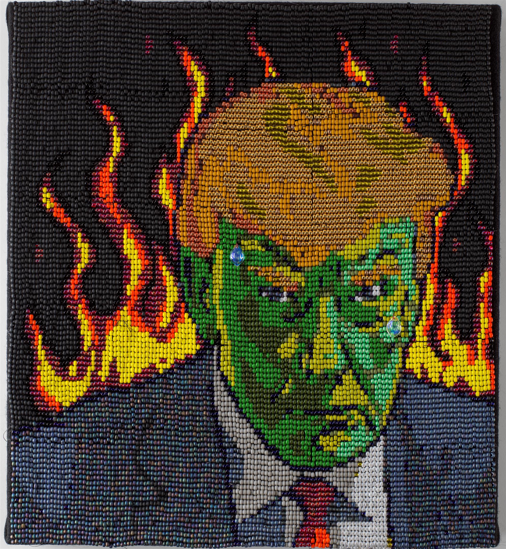Een geborduurd portret van Donald Trump met een groen gezicht, omringd door vlammen.
