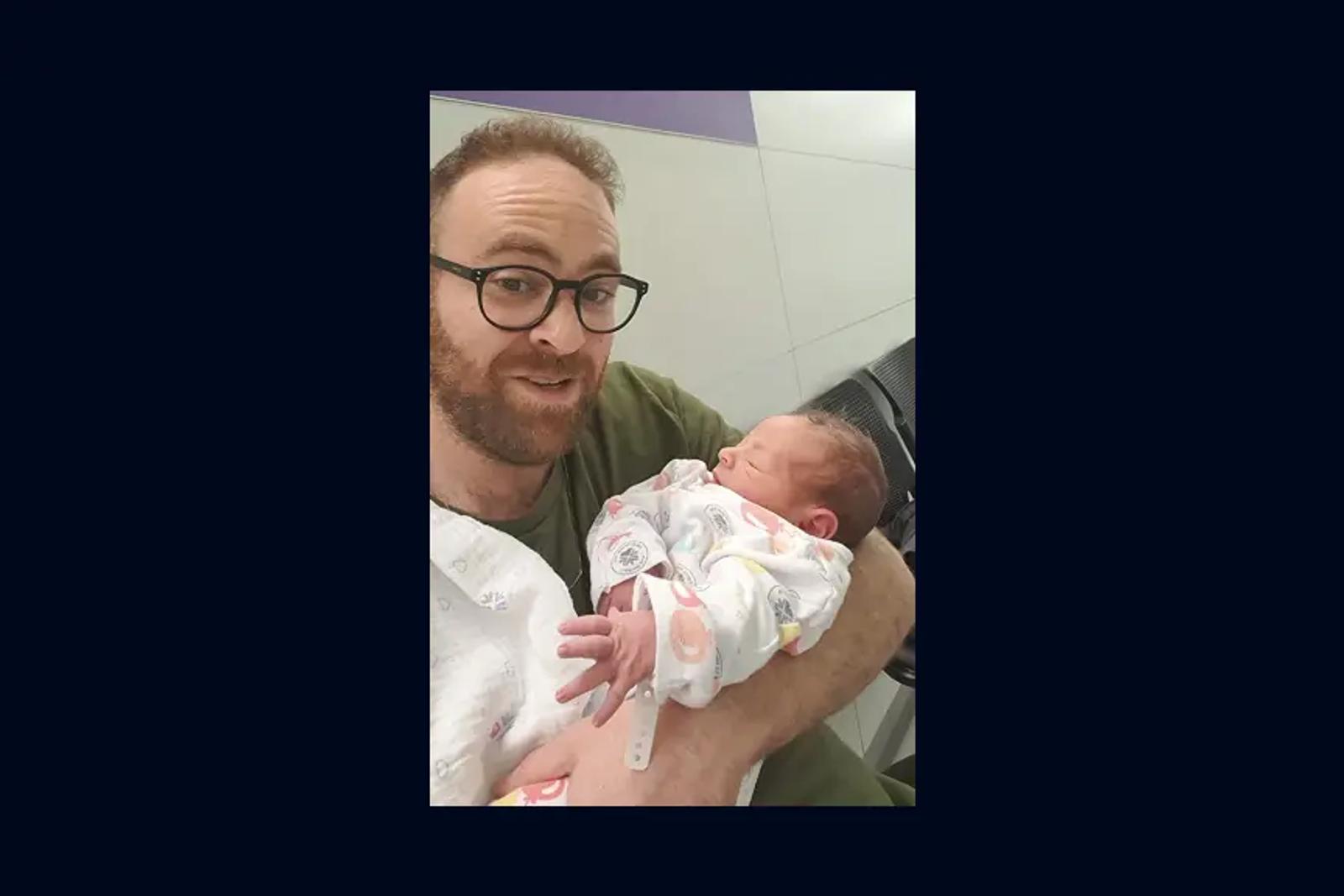 Holding my newborn son