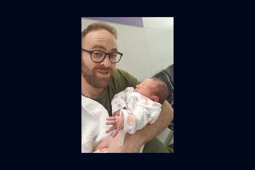 Holding my newborn son