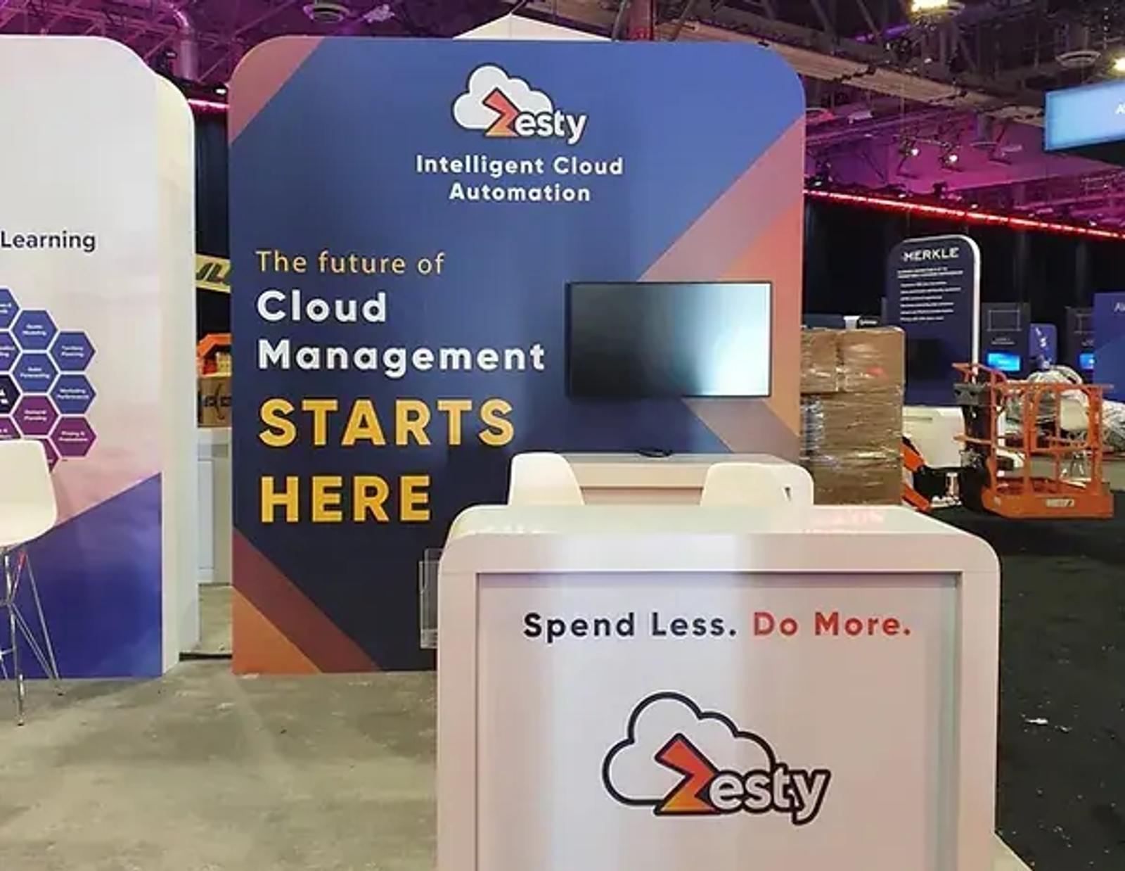 Zesty conference booth: Spend Less. Do More.