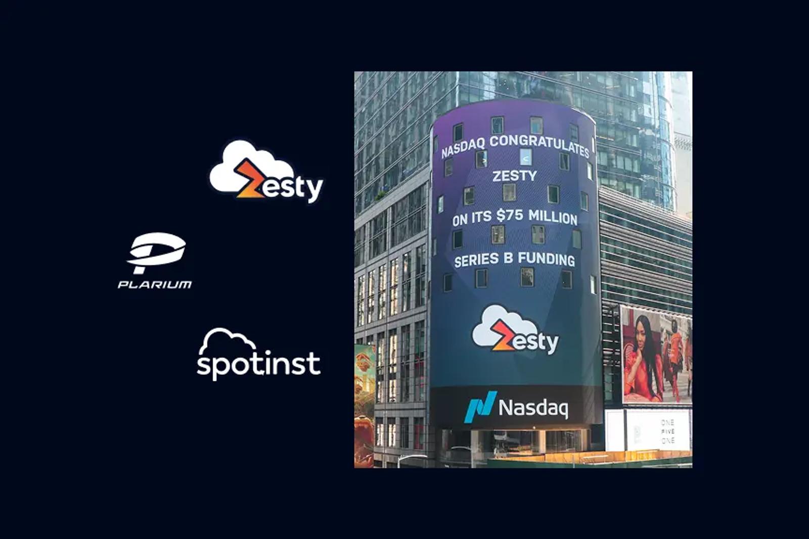Zesty on the Nasdaq billboard, with Plarium and Spotinst logos