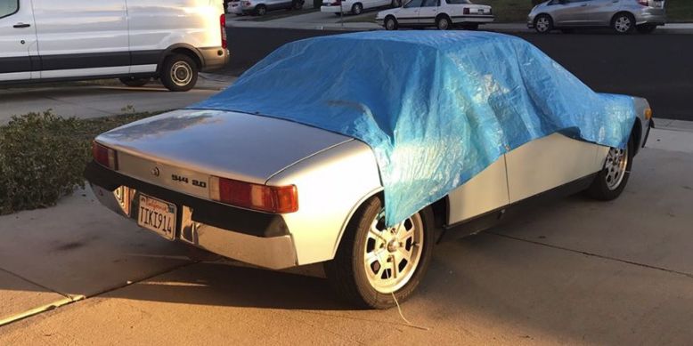 Tarp Covered Car