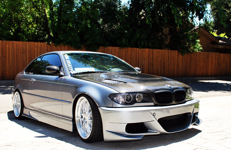 A picture containing tree, car, outdoor, transport Description automatically generated