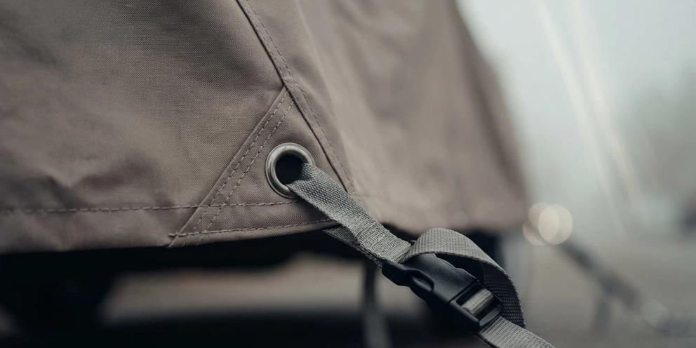 Grommet + tie-down strap