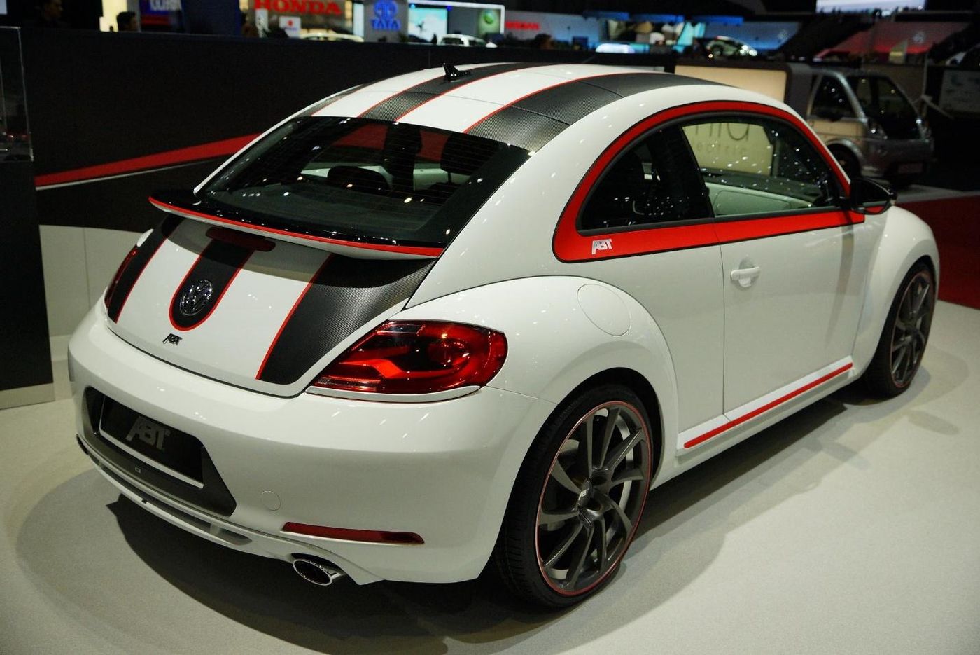 A white sports car Description automatically generated with medium confidence