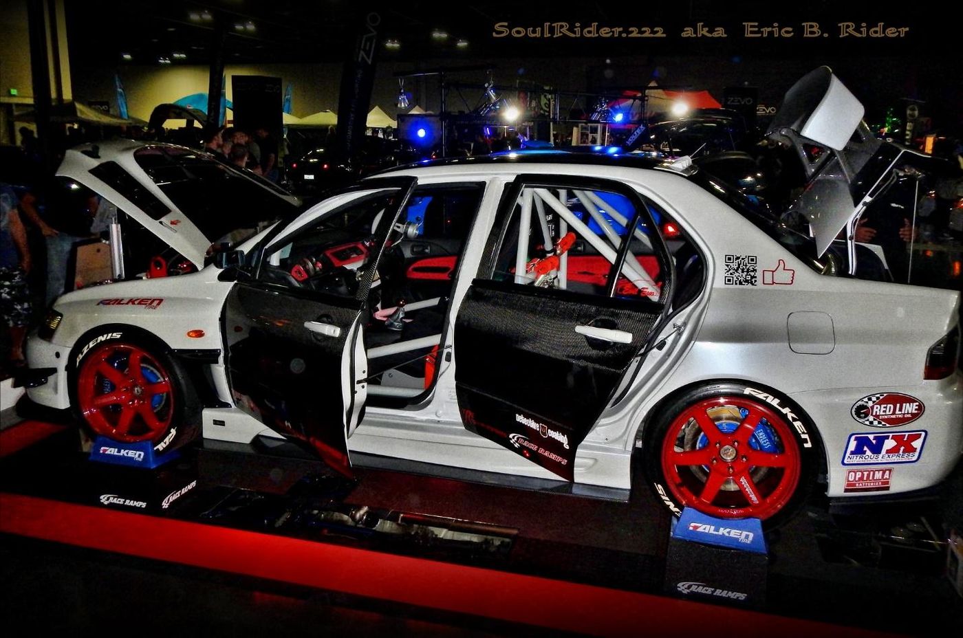 A group of race cars Description automatically generated with low confidence